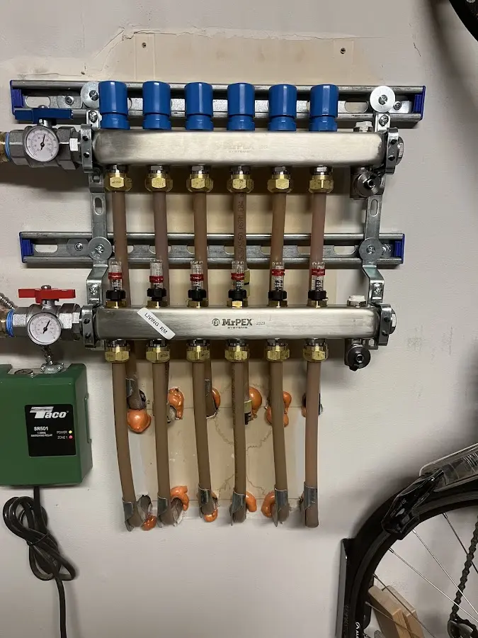 Plumber performing Gas Leak Detection at a residential property in Sturbridge